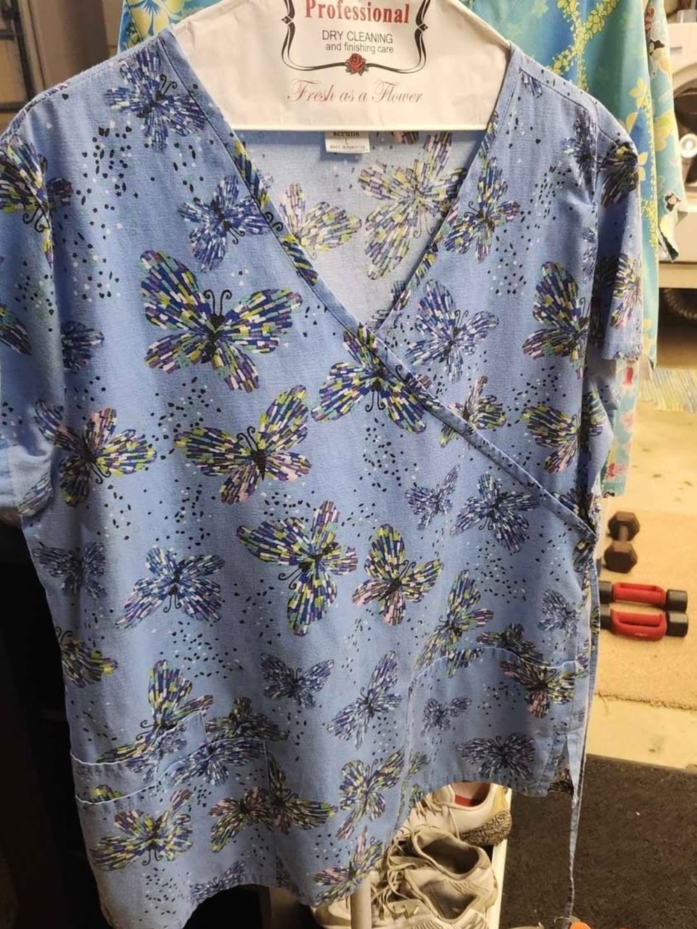 Butterfly Print Wrap-Style Women’s Scrub in Light Blue